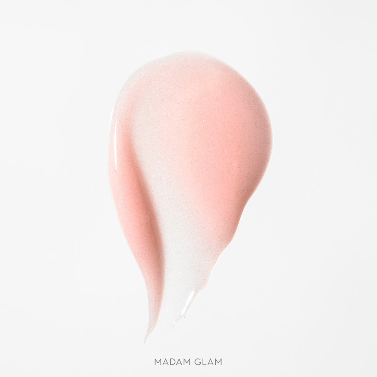 Błyszczyk do ust Hedonista Madam Glam Lipgloss – jasny, mleczno-różowy odcień z subtelnym połyskiem, swatch produktu