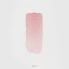 Róż rozświetlający Hedonista RoseLighter Cream Rose – kremowy pudrowo-różowy odcień, swatch produktu